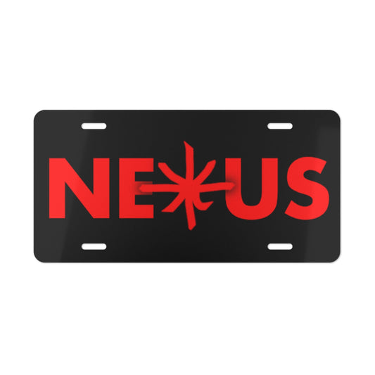 A vanity license plate with the word "NEXUS" in bold red letters, incorporating the NEXUS logo in place of the letter "X," on a black background.